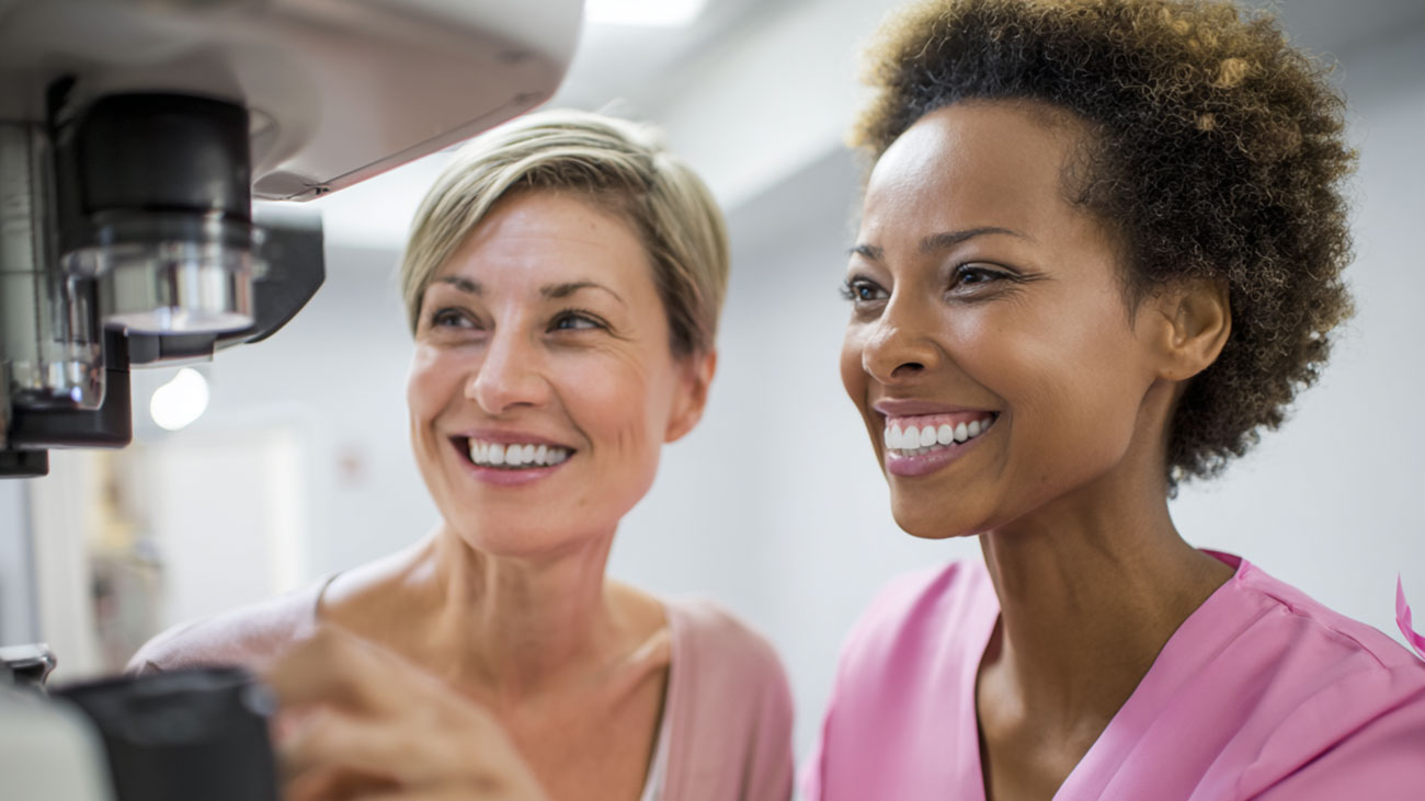 A woman reviews her 3D mammogram screening results with her doctor at a Bronx imaging center.