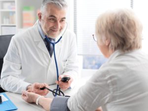 Doctor talking to patient