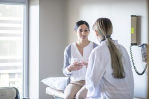 Doctor and patient talking