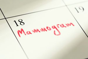 Mammogram appointment marked in red on calendar. Vital health check.