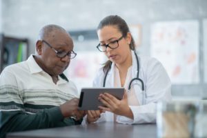 Lady primary care Doctor discussing the report result with patient